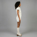 Women's Vanilla PU Leather Cap Sleeve Romper - Left